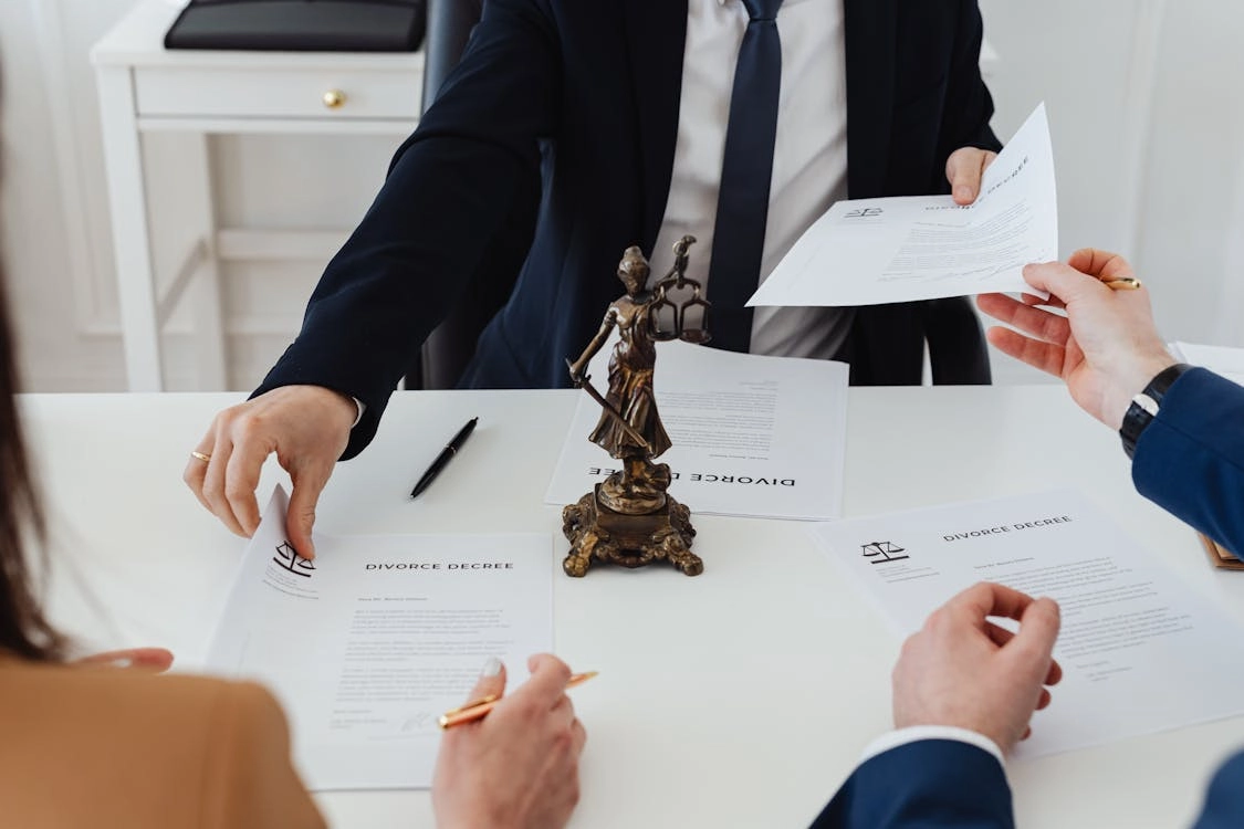Legal documents being reviewed for divorce