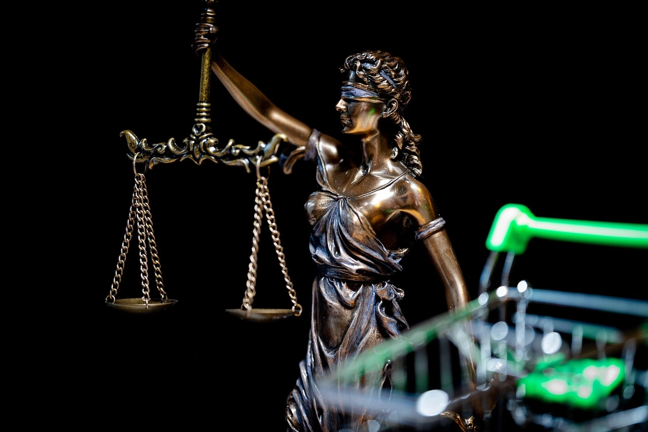 Statue of Lady Justice holding scales.
