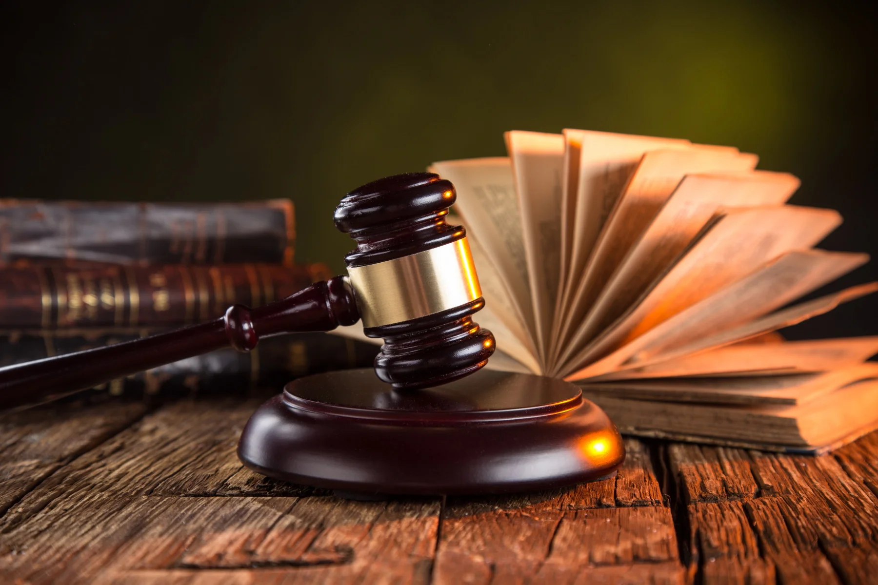 Gavel and law books on table